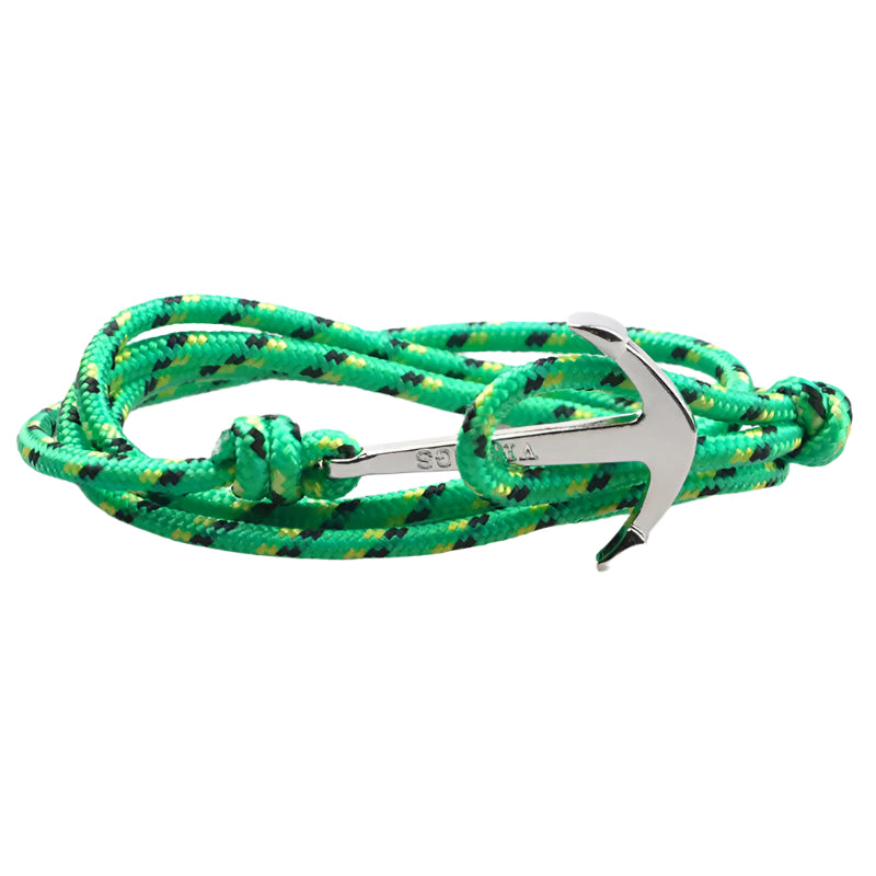 Green and black braided rope bracelet with a silver anchor charm on a white background.