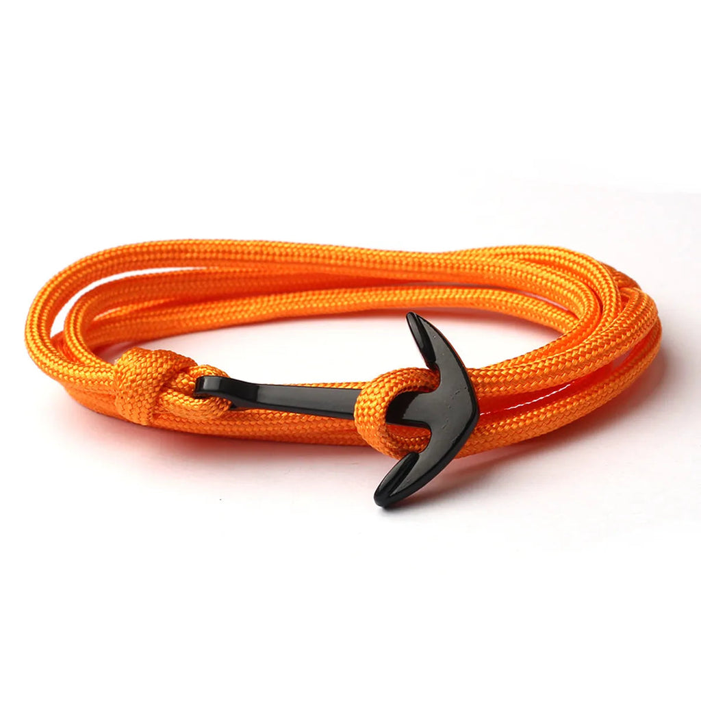 Orange rope bracelet with a black anchor clasp on a white background